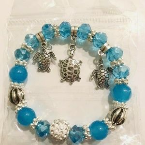 Handmade charm bracelet with turtle charms